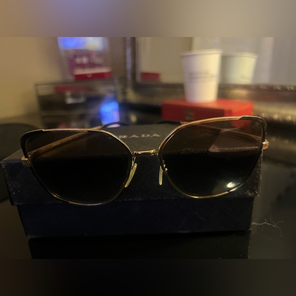 Prada Women's Sunglasses with Gold Frame